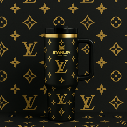 Stanley reusable travel cup in deluxe brown tone with gold print details